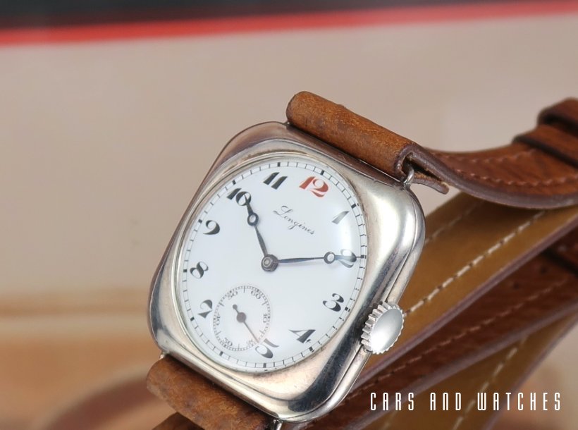 Rare century old silver Longines cushion watch