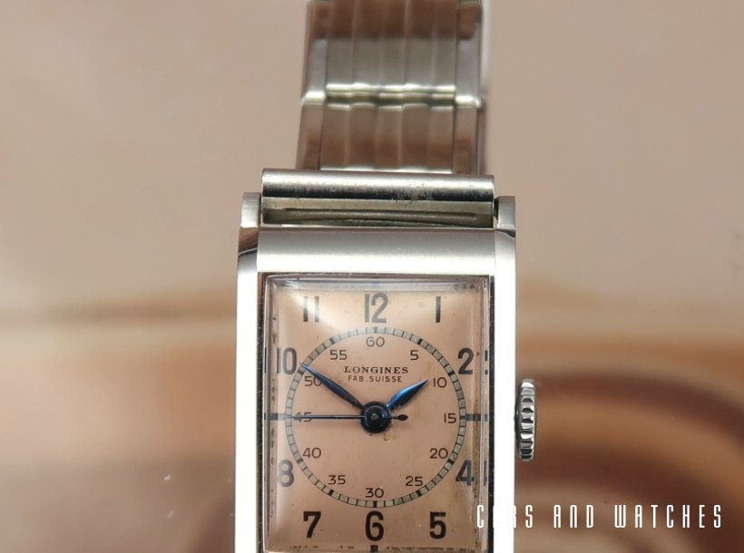 Stunning mint Longines Tank Medicus with pink dial